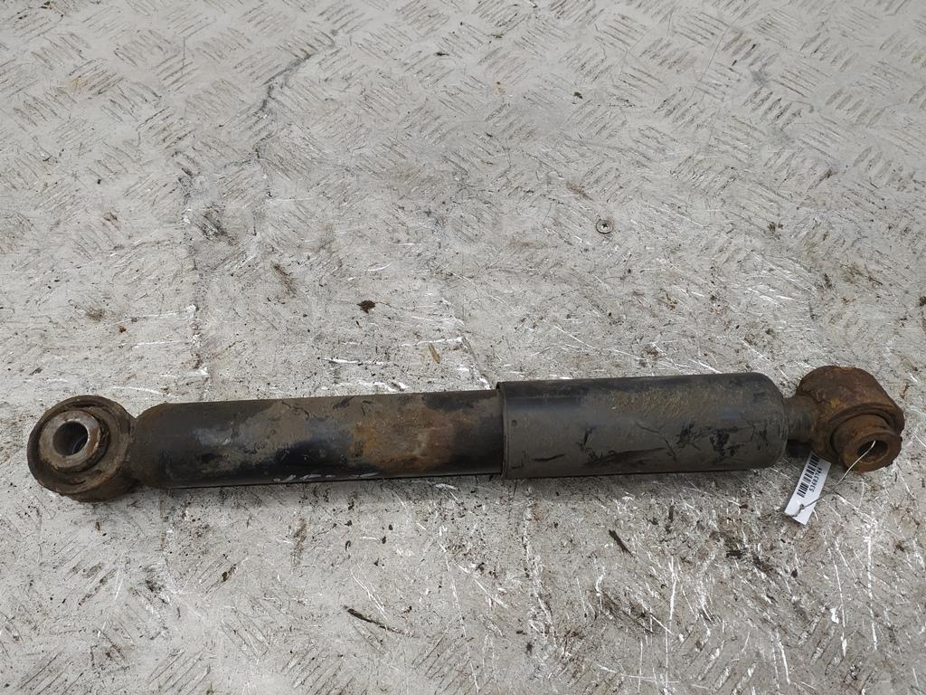 Амортизатор задний левый