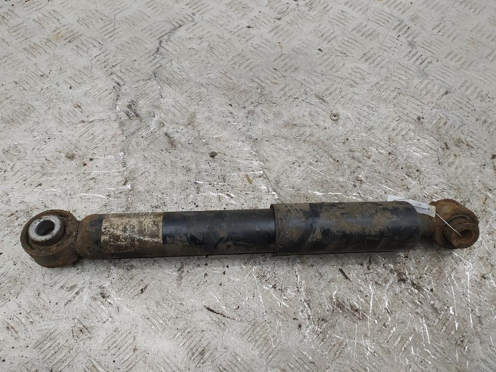 Амортизатор задний левый