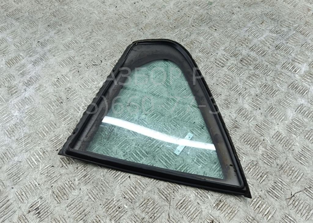 Стекло двери задней левой (форточка)