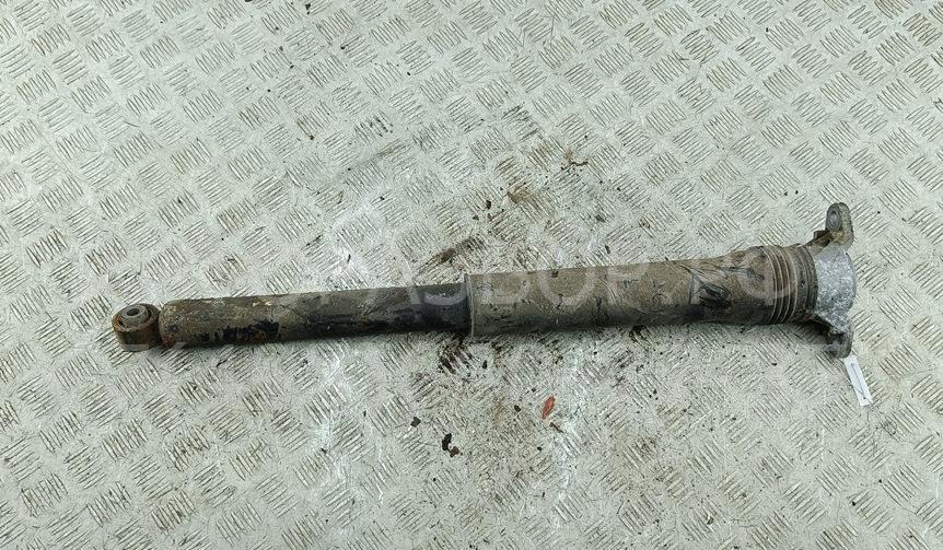 Амортизатор задний левый