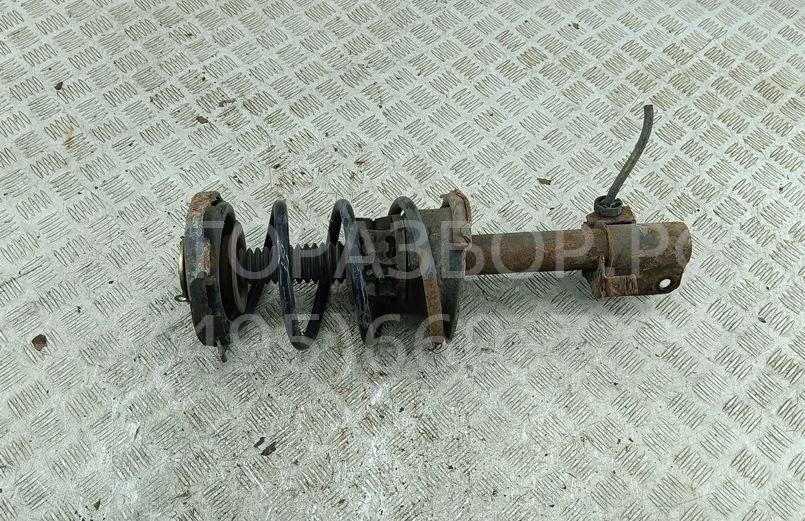 Амортизатор передний левый