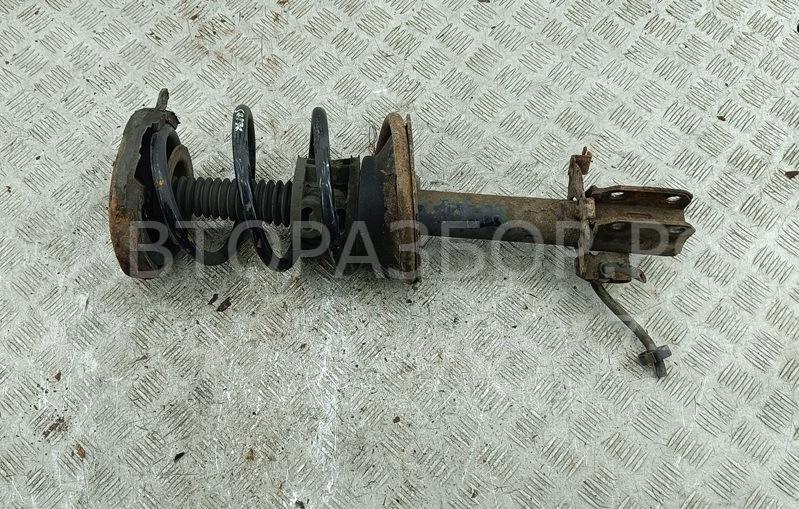 Амортизатор передний левый