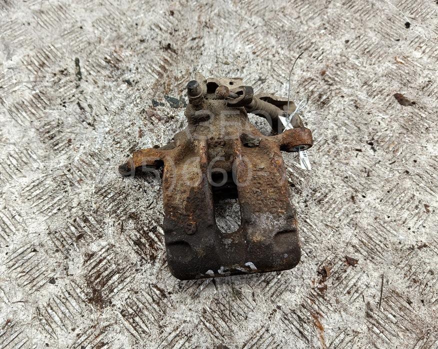 Суппорт задний левый