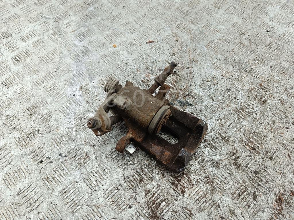 Суппорт задний левый