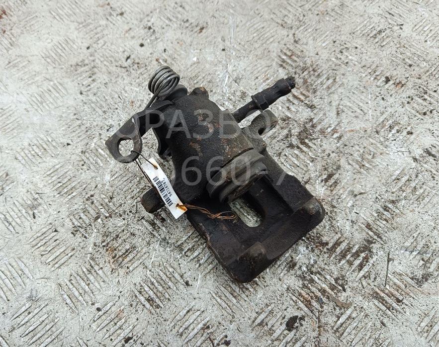 Суппорт задний левый