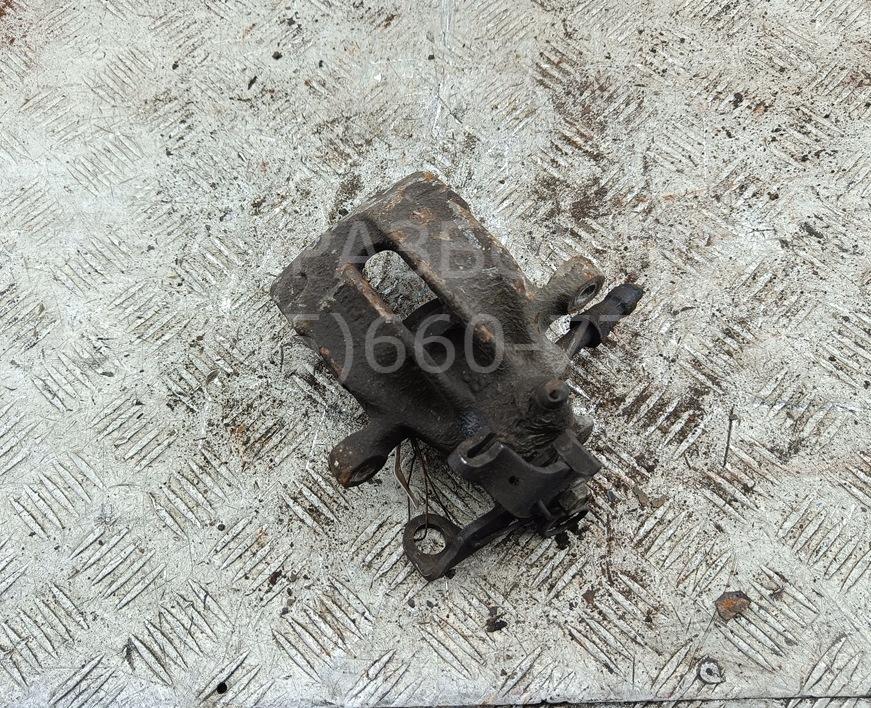 Суппорт задний левый