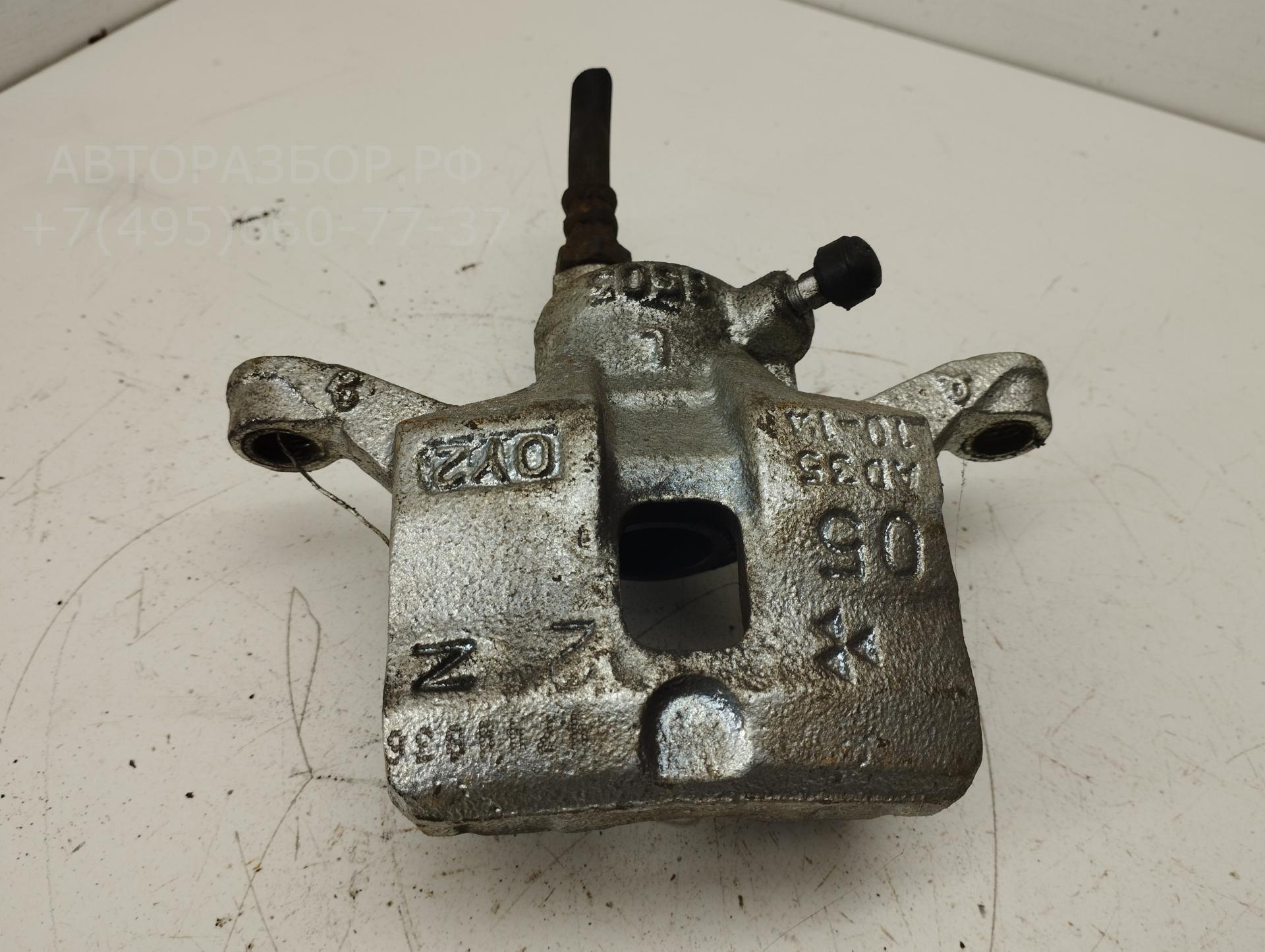 Суппорт задний левый