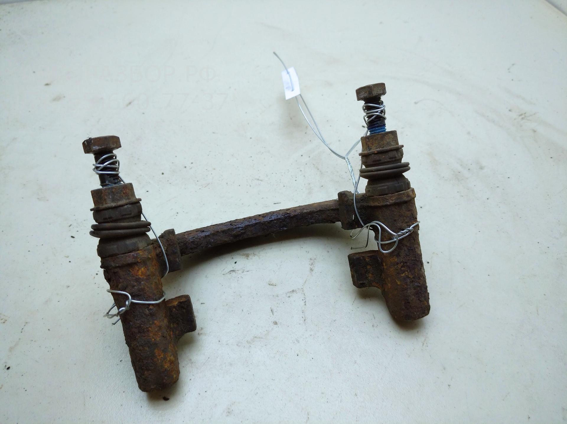 Скоба суппорта заднего