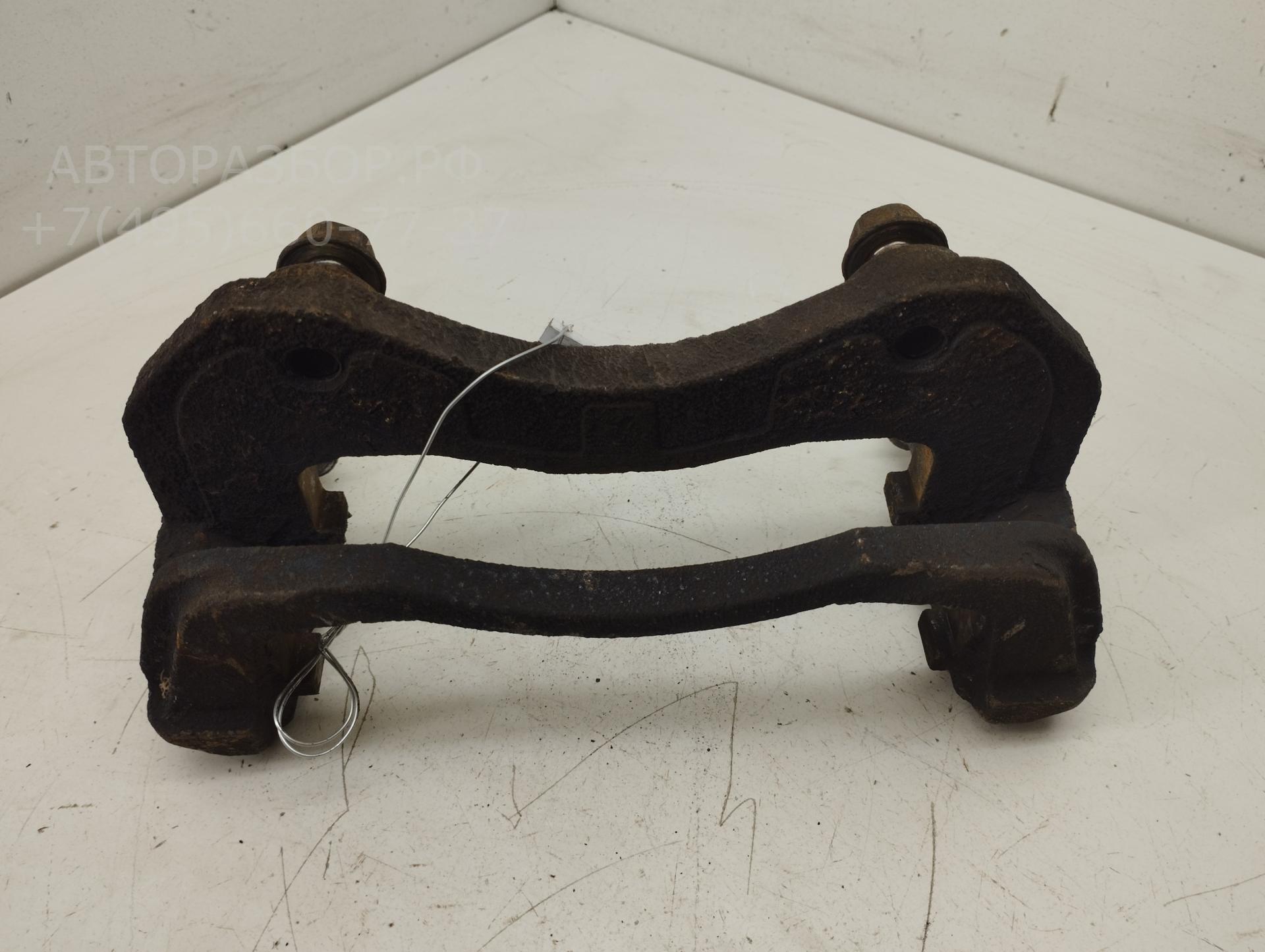 Скоба суппорта переднего