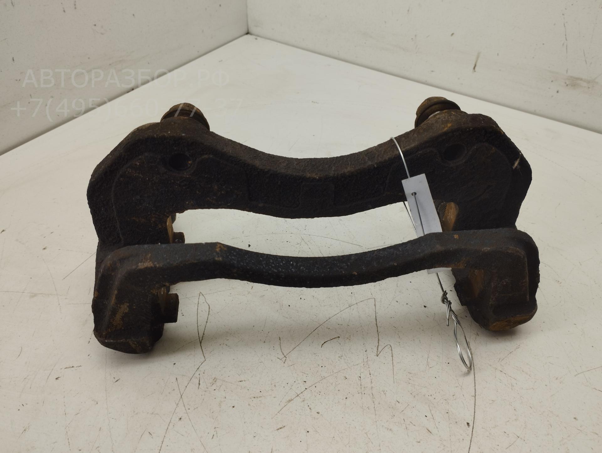 Скоба суппорта переднего