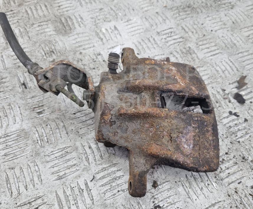 Суппорт передний левый