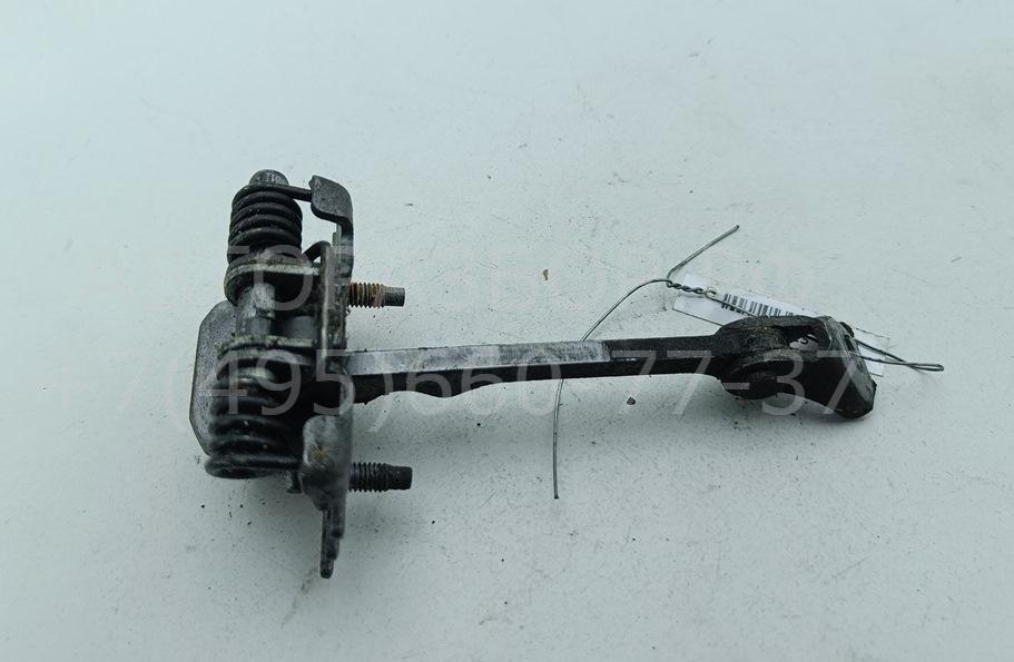 Ограничитель двери