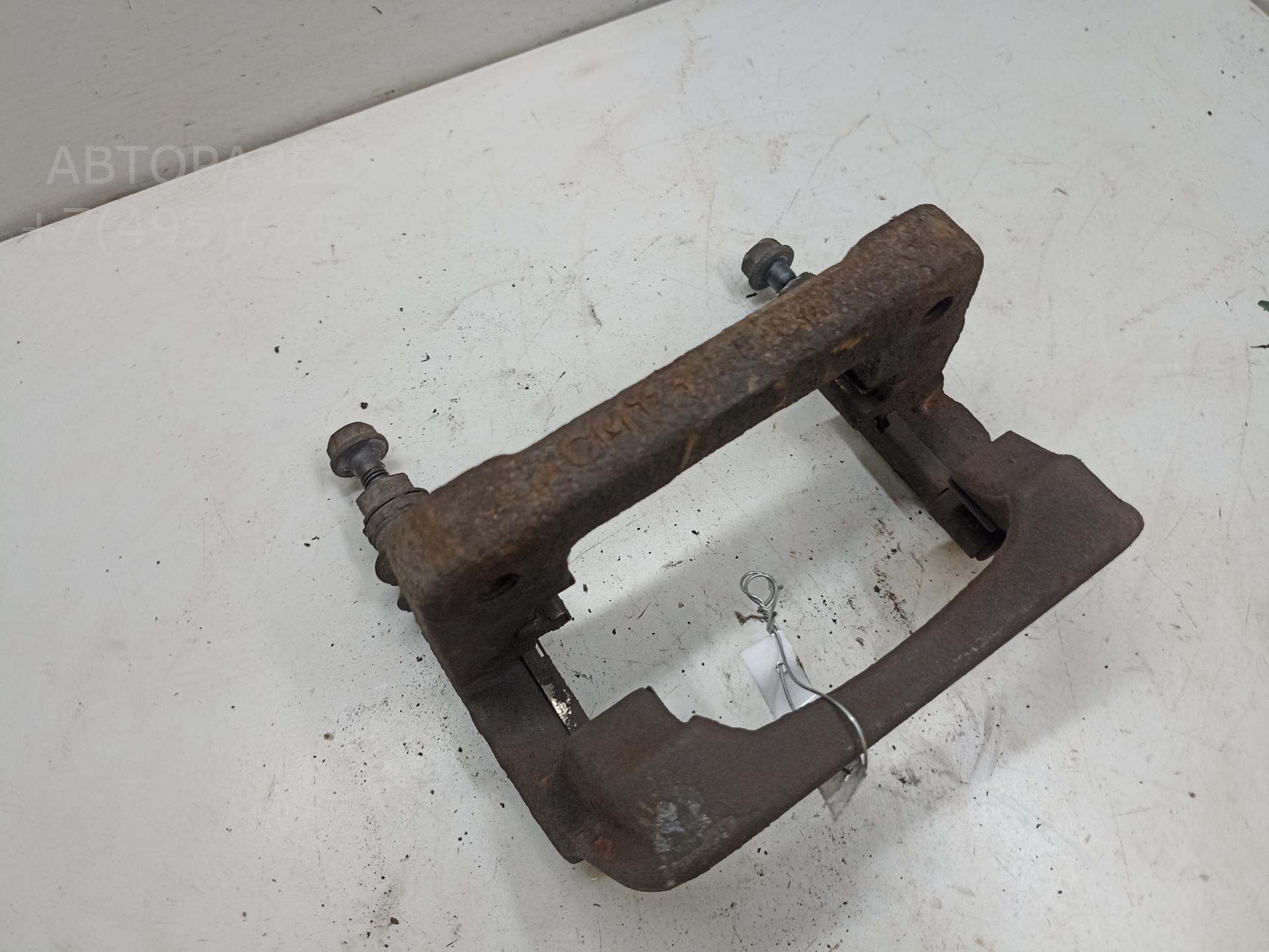 Скоба суппорта заднего