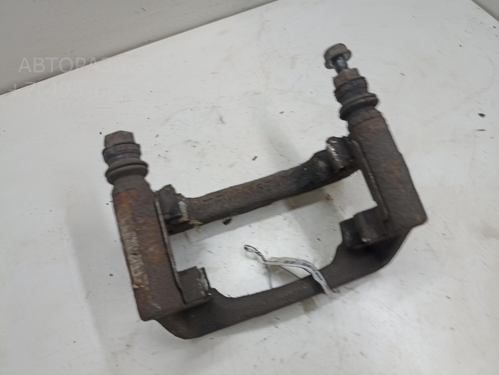 Скоба суппорта заднего