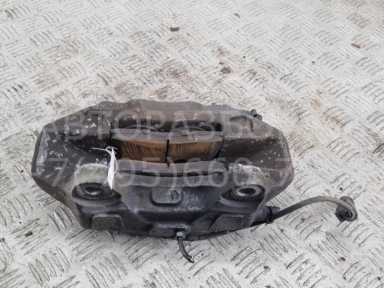 Суппорт передний левый