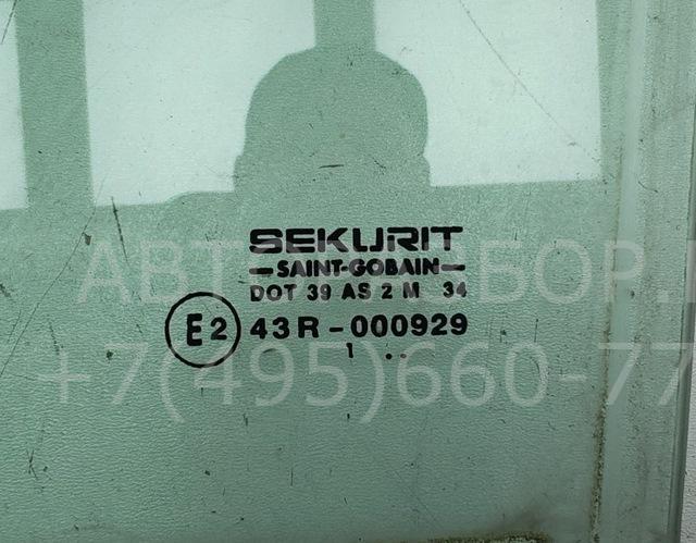Стекло двери передней левой