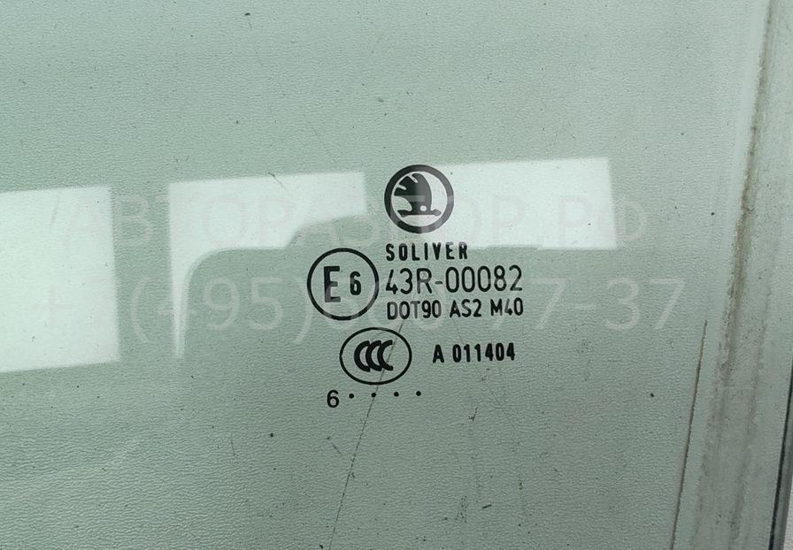 Стекло двери передней левой