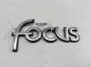 Эмблема Ford Focus I (1998-2005) Артикул 55106249 - Фото #1