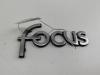 Эмблема Ford Focus I (1998-2005) Артикул 55113191 - Фото #1