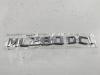 Эмблема Mercedes M-Class ML W164 (2005-2011) Артикул 55203381 - Фото #1