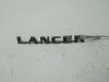 Эмблема Mitsubishi Lancer (2000-2010) Артикул 54479252 - Фото #1